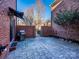 Brick paved patio area with surrounding brick wall at 9182 Bonnie Briar Cir, Charlotte, NC 28277