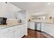 Modern kitchen with granite countertops and white cabinets at 9907 Reindeer Way Ln, Charlotte, NC 28216