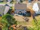 Aerial view of house and backyard with patio at 112 Marquette Dr, Mount Holly, NC 28120