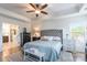 Main bedroom with ensuite bathroom access and hardwood floors at 112 Marquette Dr, Mount Holly, NC 28120