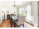 Bright dining room with hardwood floors and large windows at 112 Marquette Dr, Mount Holly, NC 28120