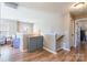 Upstairs hallway with hardwood floors and storage at 112 Marquette Dr, Mount Holly, NC 28120