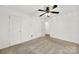 Bedroom with ceiling fan, neutral carpeting and access to another room at 114 Ashbrook Dr, Fort Mill, SC 29715