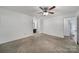 Bright bedroom with ceiling fan and carpet at 114 Ashbrook Dr, Fort Mill, SC 29715