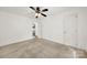 Bedroom with ceiling fan, neutral carpeting and access to another room at 114 Ashbrook Dr, Fort Mill, SC 29715