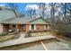 Brick front exterior, two-story home with a small porch and landscaping at 114 Ashbrook Dr, Fort Mill, SC 29715