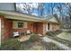 Brick front exterior, two-story home with a small porch and landscaping at 114 Ashbrook Dr, Fort Mill, SC 29715