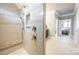 Large walk-in shower with built-in bench and double shower heads at 1422 Spring Ridge Ln, Denver, NC 28037