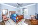 Cozy bedroom with a wooden bed frame and hardwood floors at 1422 Spring Ridge Ln, Denver, NC 28037