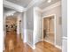 Hardwood floor hallway with access to bathroom and bedroom at 1422 Spring Ridge Ln, Denver, NC 28037