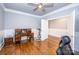 Home office with desk, hardwood floors, and access to other rooms at 1422 Spring Ridge Ln, Denver, NC 28037