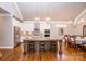 Spacious kitchen featuring granite countertops, modern appliances, and a large island at 1422 Spring Ridge Ln, Denver, NC 28037