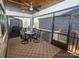 Relaxing screened porch with a ceiling fan and outdoor seating at 1422 Spring Ridge Ln, Denver, NC 28037