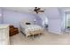 Lavender bedroom with a queen bed, and plenty of natural light at 14839 Rocky Top Dr, Huntersville, NC 28078