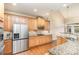 Spacious kitchen with stainless steel appliances and granite countertops at 14839 Rocky Top Dr, Huntersville, NC 28078