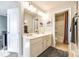 Bathroom with double vanity and a tub shower combo at 1968 Sapphire Meadow Dr, Fort Mill, SC 29715