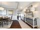 Elegant dining room featuring a wood table, hardwood floors, and stylish decor at 1968 Sapphire Meadow Dr, Fort Mill, SC 29715