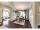 Open concept dining room with hardwood floors and chandelier at 1968 Sapphire Meadow Dr, Fort Mill, SC 29715