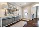 Bright entryway with a console table, mirror, and ample natural light at 1968 Sapphire Meadow Dr, Fort Mill, SC 29715