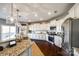 Modern kitchen with granite countertops and stainless steel appliances at 1968 Sapphire Meadow Dr, Fort Mill, SC 29715