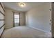 Spacious bedroom with wood-look shelving and neutral walls at 2229 Iron Works Dr, Clover, SC 29710