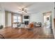 Spacious living room with hardwood floors, fireplace, and lots of natural light at 2229 Iron Works Dr, Clover, SC 29710