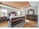 Spacious main bedroom with a king-size bed and ensuite bathroom at 2229 Iron Works Dr, Clover, SC 29710