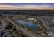 Aerial view of community with lake and walking paths at 2547 Bullfrog Ln, Lancaster, SC 29720