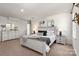 Main bedroom with a whitewashed bed frame and neutral decor at 2547 Bullfrog Ln, Lancaster, SC 29720