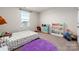 bedroom with playful decor and built-in shelving at 2547 Bullfrog Ln, Lancaster, SC 29720