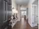 Bright and spacious entryway with hardwood floors and a stylish console table at 2547 Bullfrog Ln, Lancaster, SC 29720