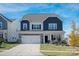 Two-story house with gray siding, white accents, and a landscaped front yard at 2547 Bullfrog Ln, Lancaster, SC 29720