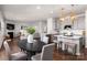 Modern kitchen with an island, gray cabinets and breakfast area at 2547 Bullfrog Ln, Lancaster, SC 29720