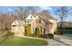 Two story brick home with a landscaped yard and driveway at 2740 Smith Field Dr, Monroe, NC 28110