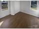 Bedroom with wood flooring and large windows at 2823 Edsel Pl, Charlotte, NC 28205