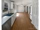 Kitchen with stainless steel appliances, wood flooring and sink at 2823 Edsel Pl, Charlotte, NC 28205