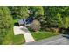 Aerial view of the property highlighting the driveway and landscaping at 3309 E Broad St, Statesville, NC 28625