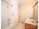 Bright bathroom features a shower-tub combo and double sink vanity at 3309 E Broad St, Statesville, NC 28625