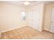 A neutral bedroom with carpet flooring, ample closet space, and natural lighting at 3309 E Broad St, Statesville, NC 28625
