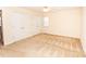 A bright, neutral bedroom with carpet flooring, ample closet space, and natural lighting at 3309 E Broad St, Statesville, NC 28625
