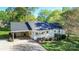 Charming single-story home featuring a welcoming front porch and a convenient carport at 3309 E Broad St, Statesville, NC 28625