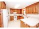 Traditional kitchen with light-toned countertops and abundant wood cabinetry at 3309 E Broad St, Statesville, NC 28625