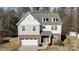 Two-story house with gray siding, brick bottom, and detached shed at 356 Nantucket Way, Rock Hill, SC 29732