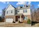 Two-story brick home with gray siding, white garage door, and landscaping at 356 Nantucket Way, Rock Hill, SC 29732