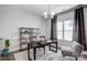 Home office with a desk, shelving, and two armchairs at 356 Nantucket Way, Rock Hill, SC 29732