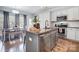 Gray kitchen island with granite countertop, sink, and dishwasher at 356 Nantucket Way, Rock Hill, SC 29732