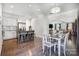 Open concept kitchen and dining area with hardwood floors and an island at 356 Nantucket Way, Rock Hill, SC 29732