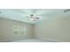 Bright bedroom with neutral carpet, ceiling fan and a bright window at 4104 Granite Cir, Indian Land, SC 29707