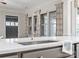 Close-up of a kitchen island sink with stainless steel faucet and stylish countertops at 4104 Granite Cir, Indian Land, SC 29707