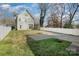 Backyard with detached garage and a privacy fence at 419 Sylvania Ave, Charlotte, NC 28206